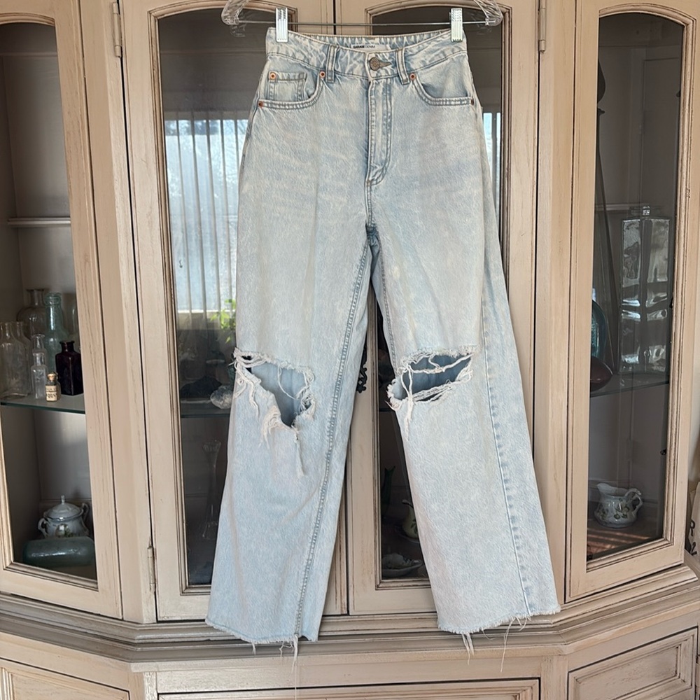 Garage light blue street jeans  wide leg, with rips in the knees. Size  00